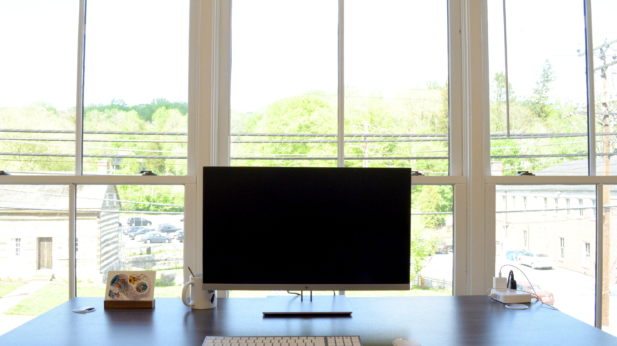 Computer monitor on a coworking office desk